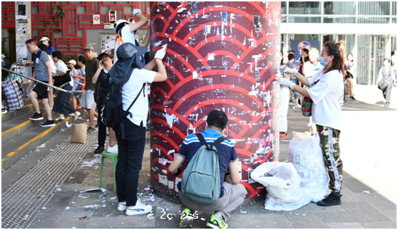 香港多區市民清理反對派標語，何君堯：香港人可以團結把事情做好